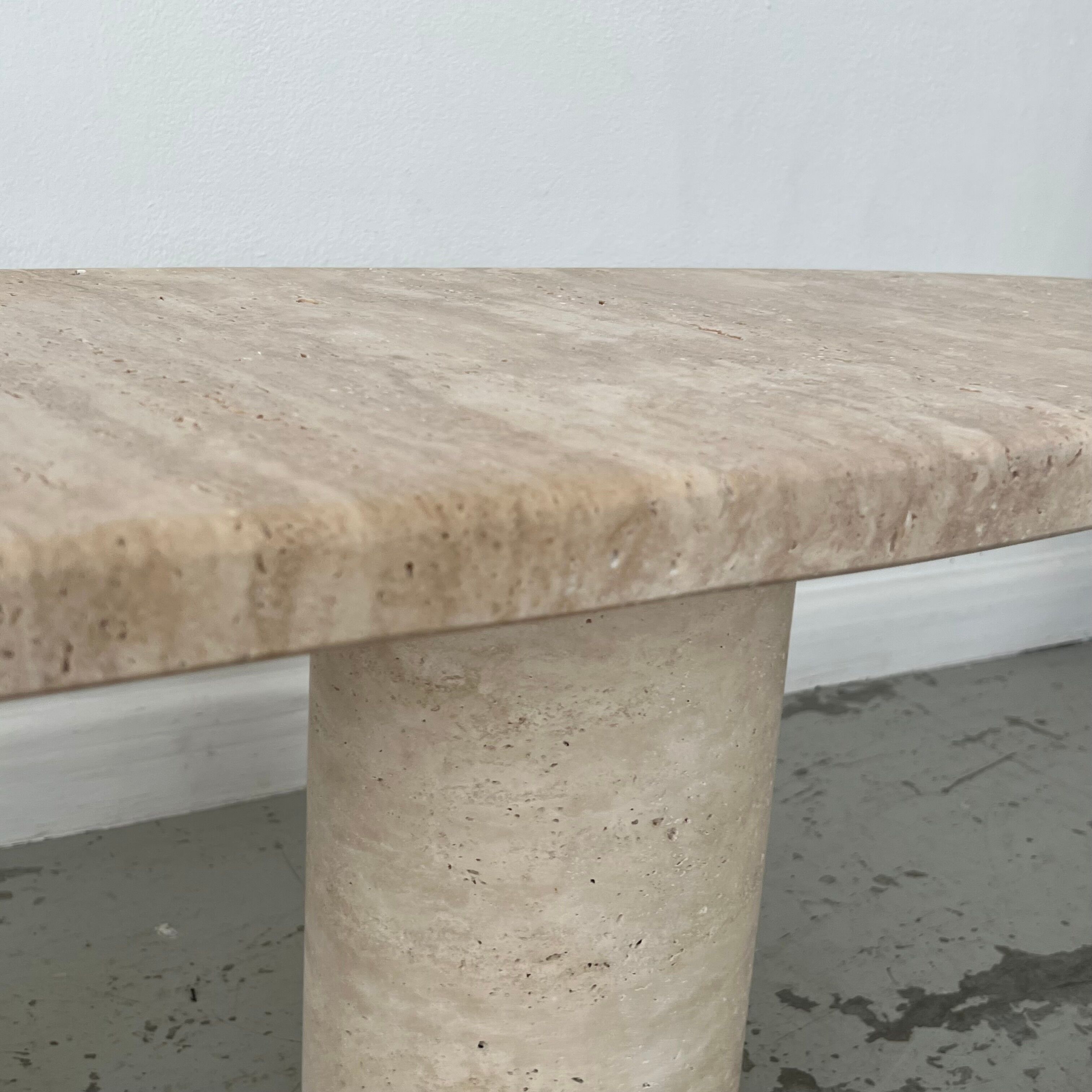 Oval travertine coffee table
