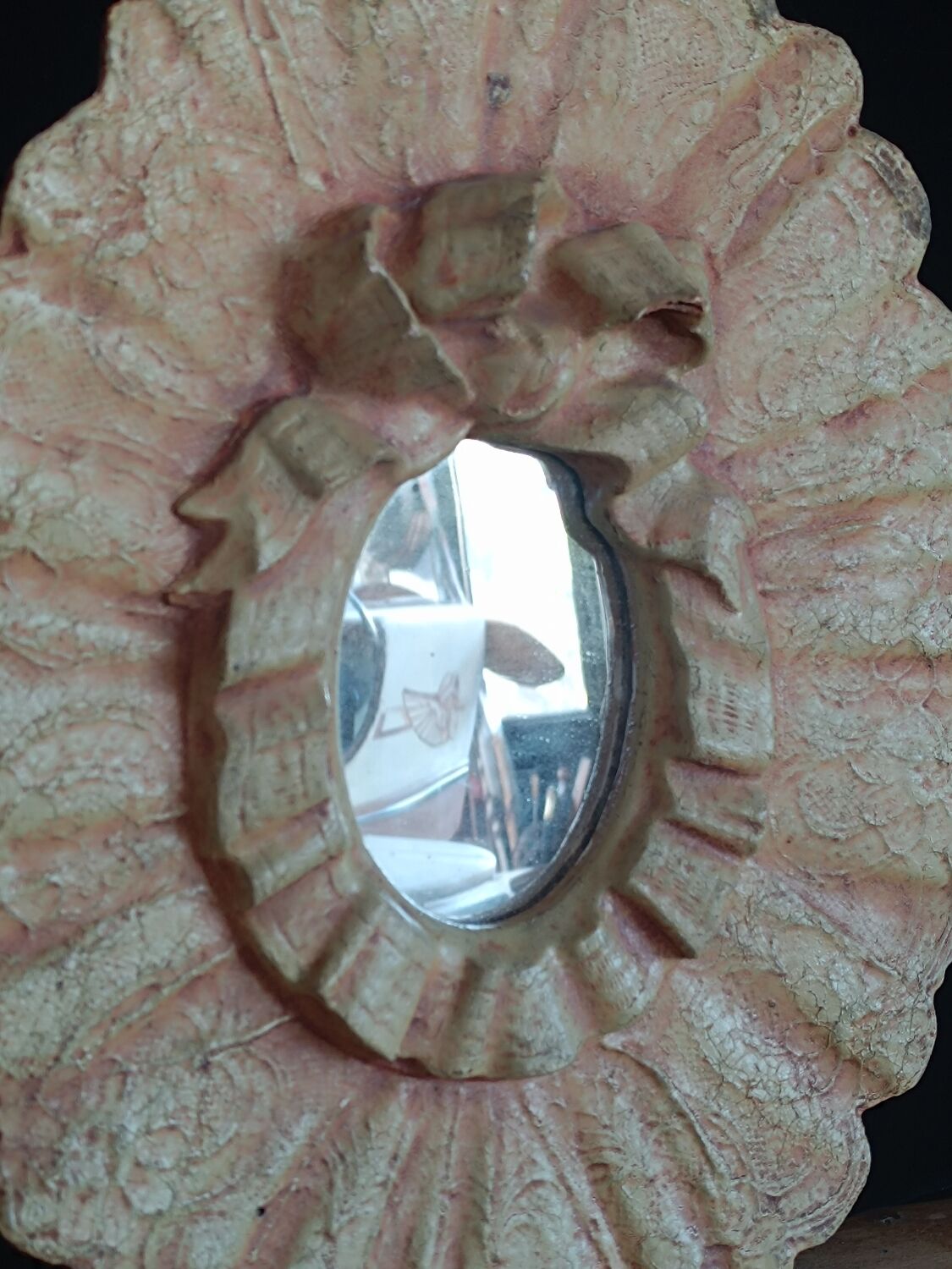 Painted oval plaster mirror
