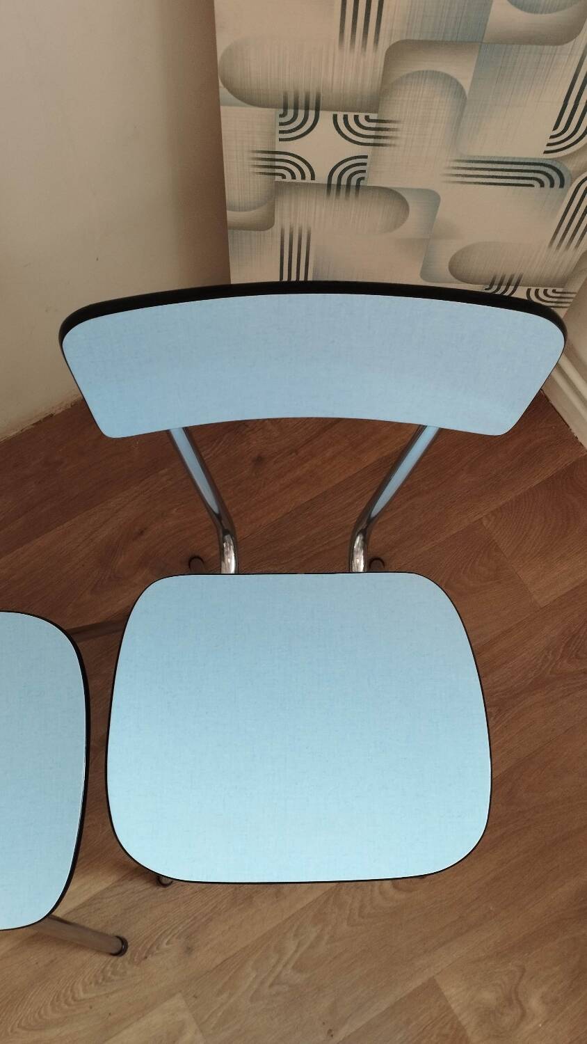 4 blue Formica chairs