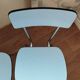 4 blue Formica chairs