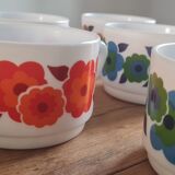 Set of seven arcopal coffee cups