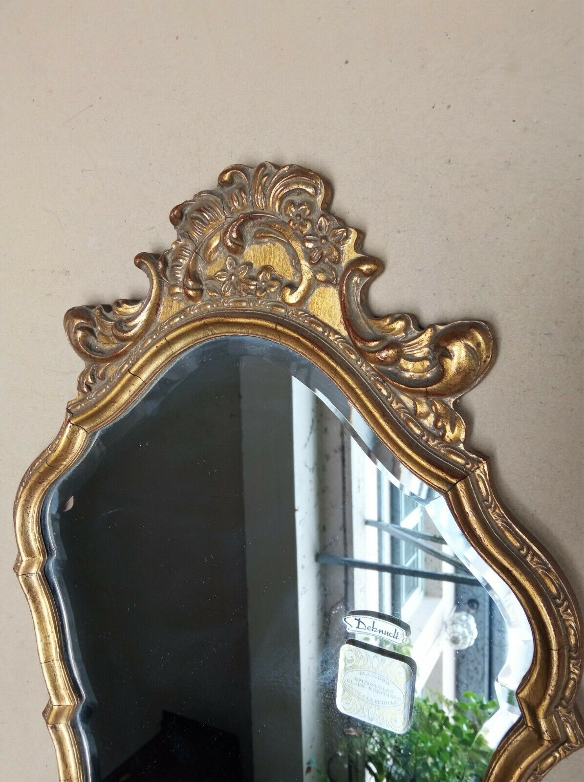 Golden wall mirror with gold leaf Deknudt - beveled ice - Louis XV style