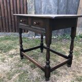 Vintage desk table in solid oak with 1 drawer facing turned legs with sleepers.