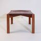 Vintage coffee table with a teak top by Jens Quistgaard, concave top, Denmark, 1960s.