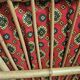 Vintage rattan chair with red fabric – 1960s/70s