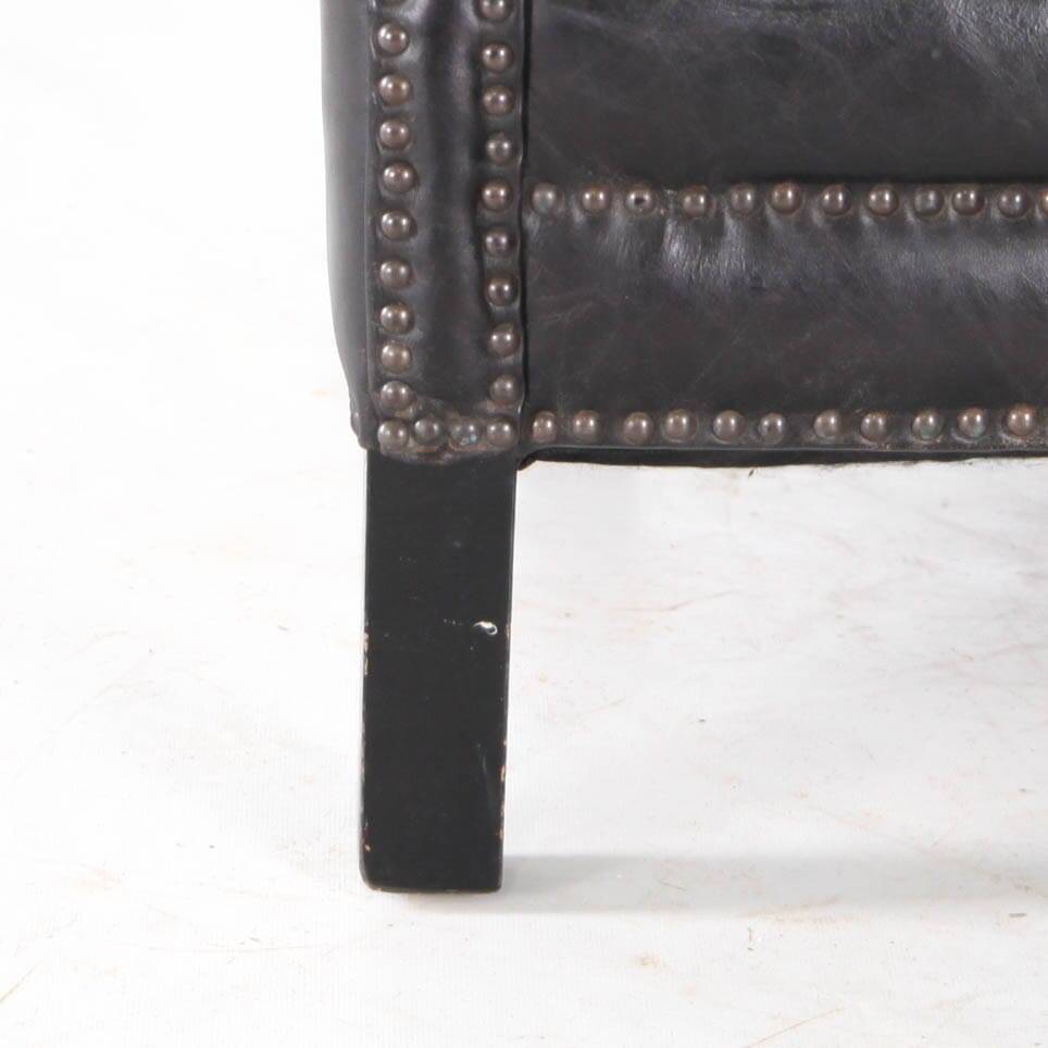 Pair of small leather club armchairs