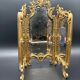 Triptych mirror, gilt bronze, circa 1900.