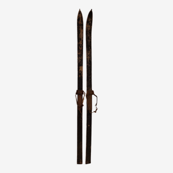 Pair of black old wooden skis 215 cm