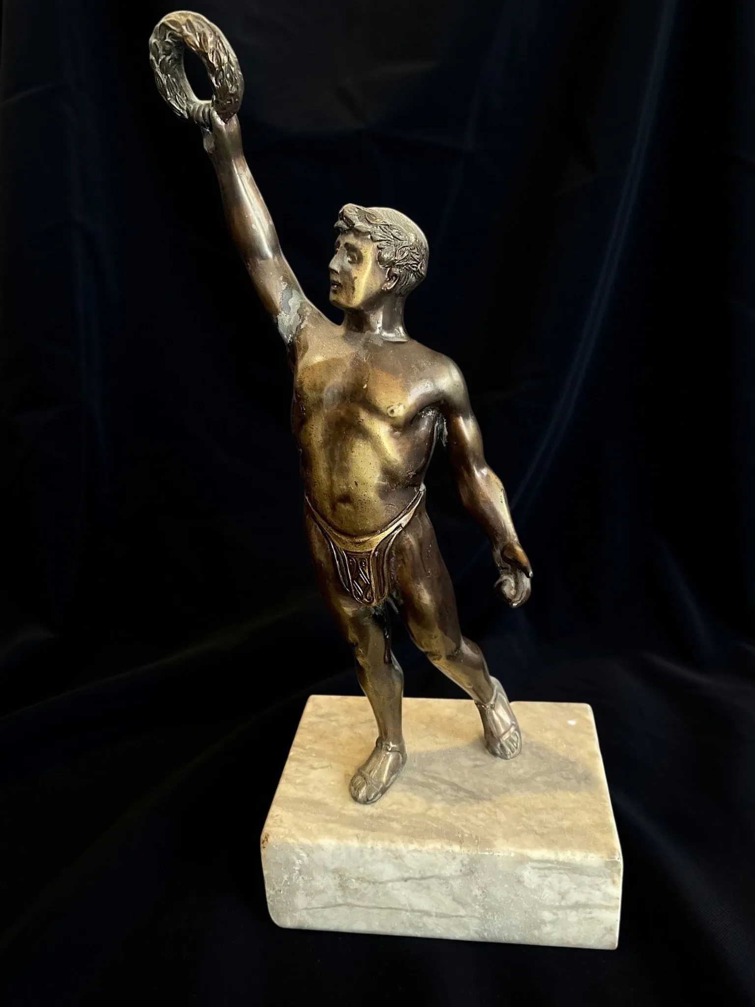 Antique bronze sculpture on a marble base, Roaring Twenties, around 1930.