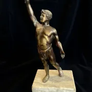 Antique bronze sculpture on a marble base, Roaring Twenties, around 1930.