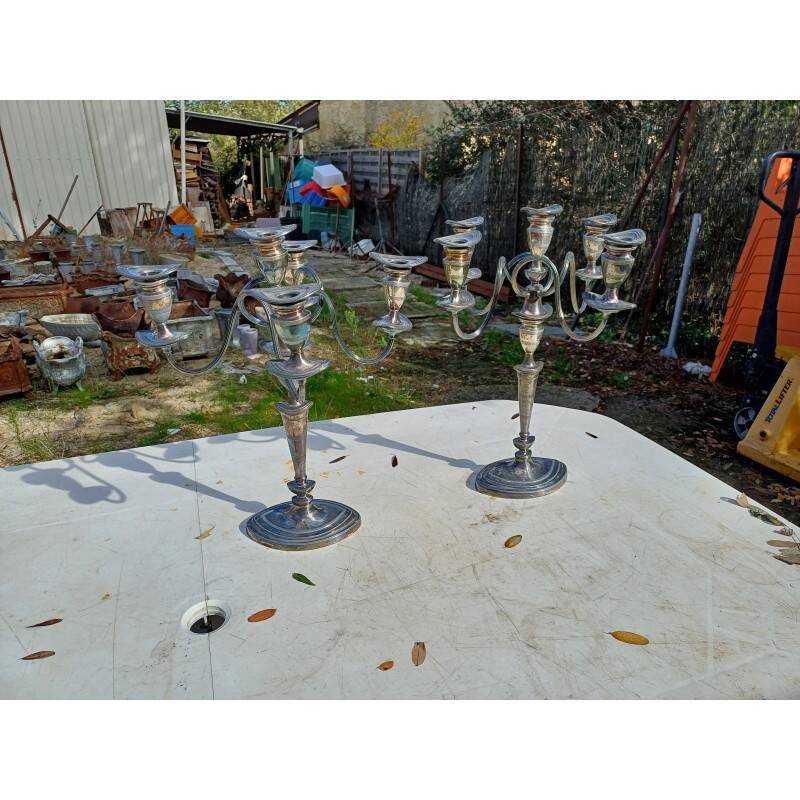 Pair of silver-plated metal candlesticks