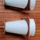 Pair of Louis Kalff frosted wood and opaline sconces