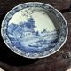 Vintage hollow circular plate in blue and white Boch pottery.