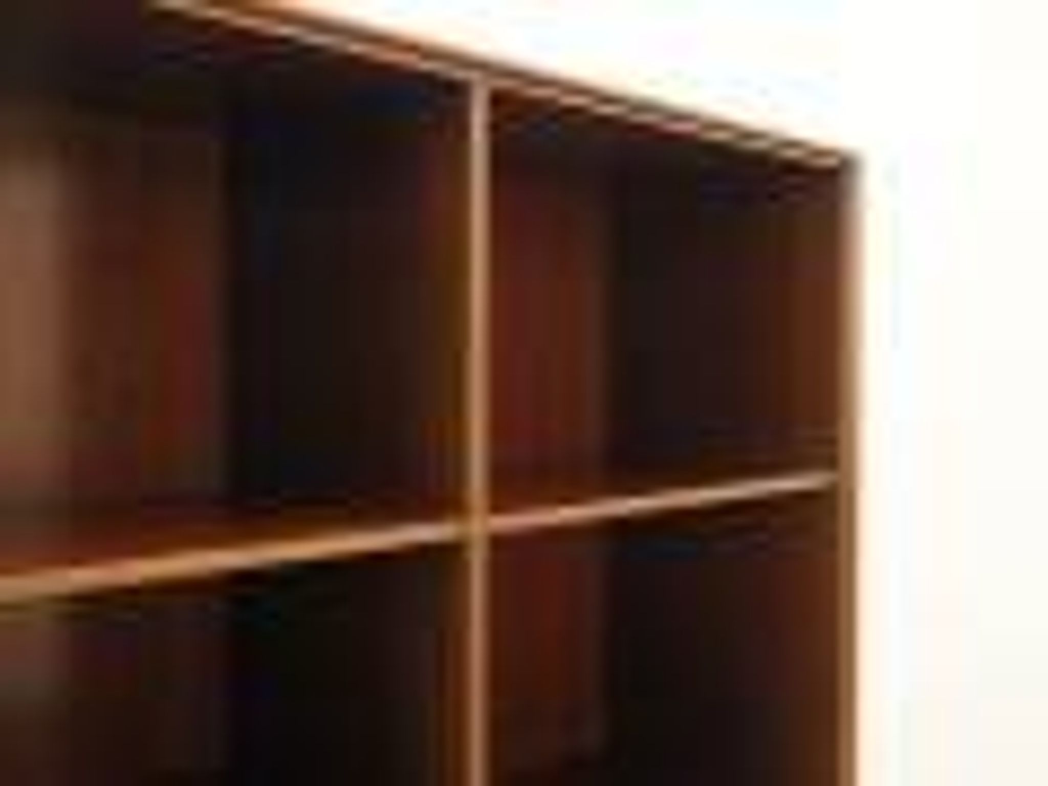 Danish mahogany veneered shelving unit on splayed legs, 1960s