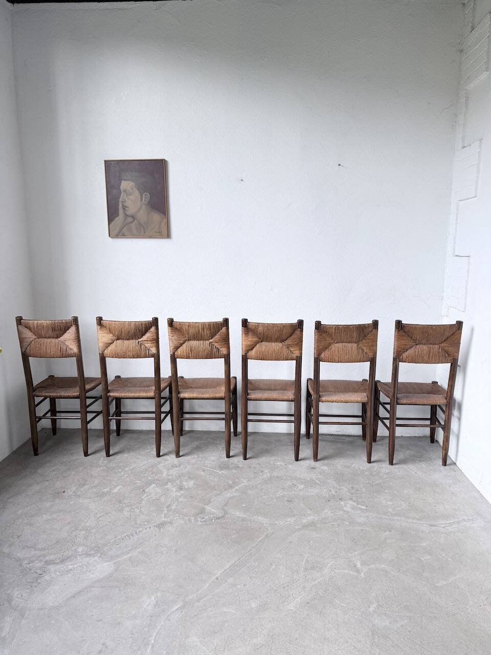 Set of 6 straw and oak Beauche chairs.