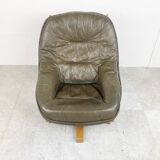 Brutalist oak and leather swivel chair, 1970s