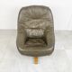 Brutalist oak and leather swivel chair, 1970s