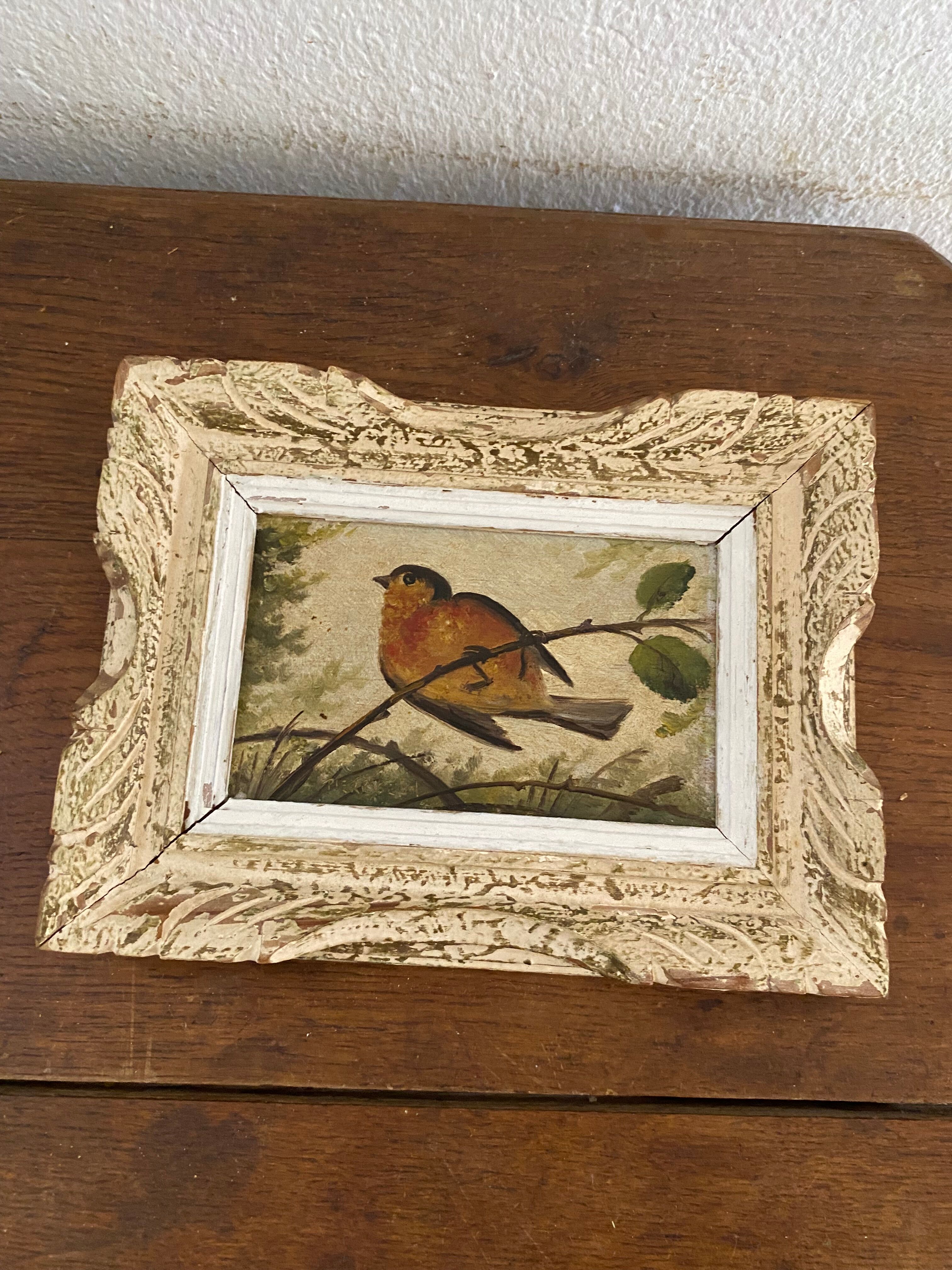 Vintage frame bird painting on a branch