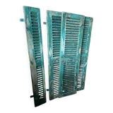 Old green shutter blinds