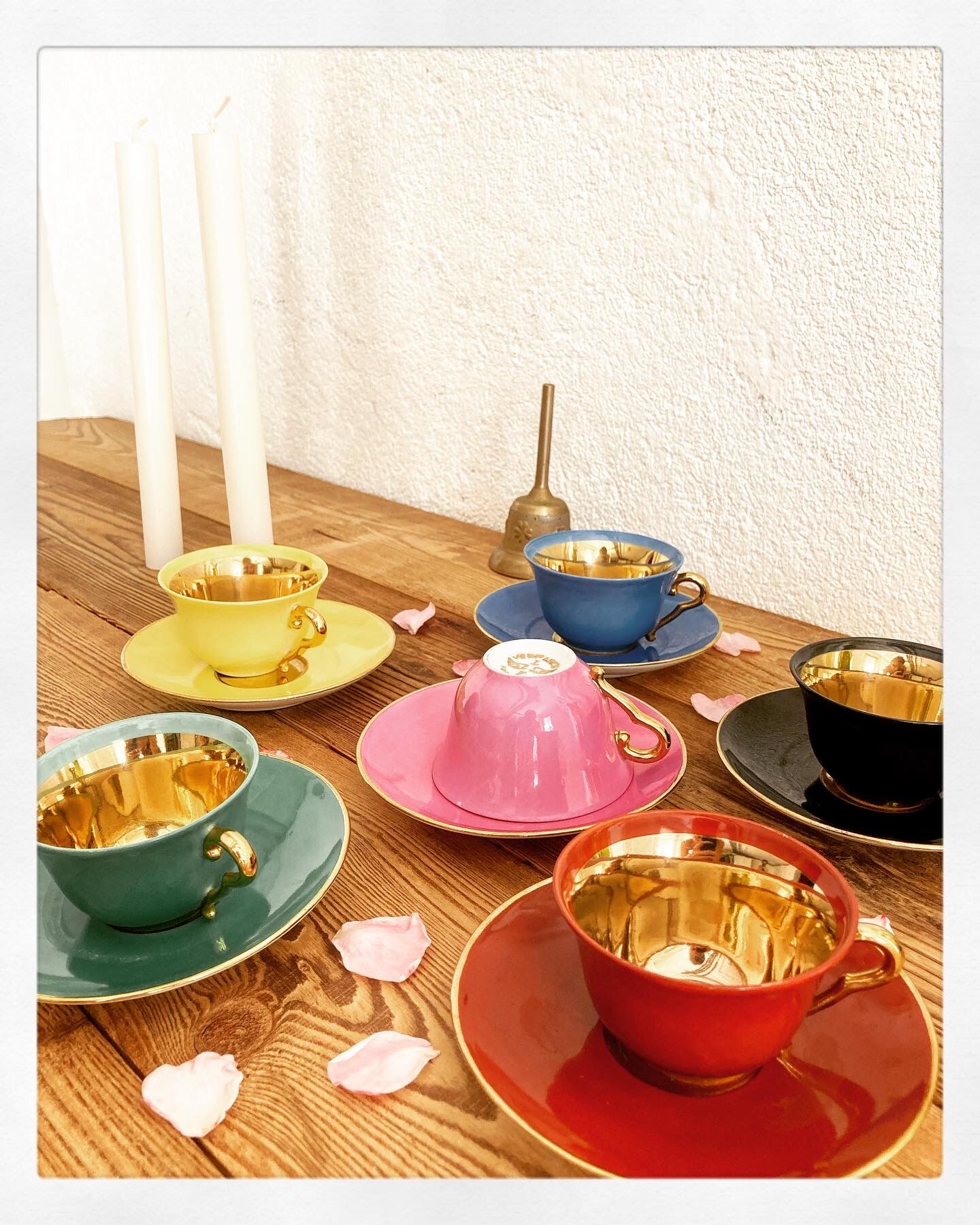 Set of colorful porcelain cups and cups