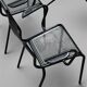 Set of 6 armchairs and perforated metal table from the 1950s.