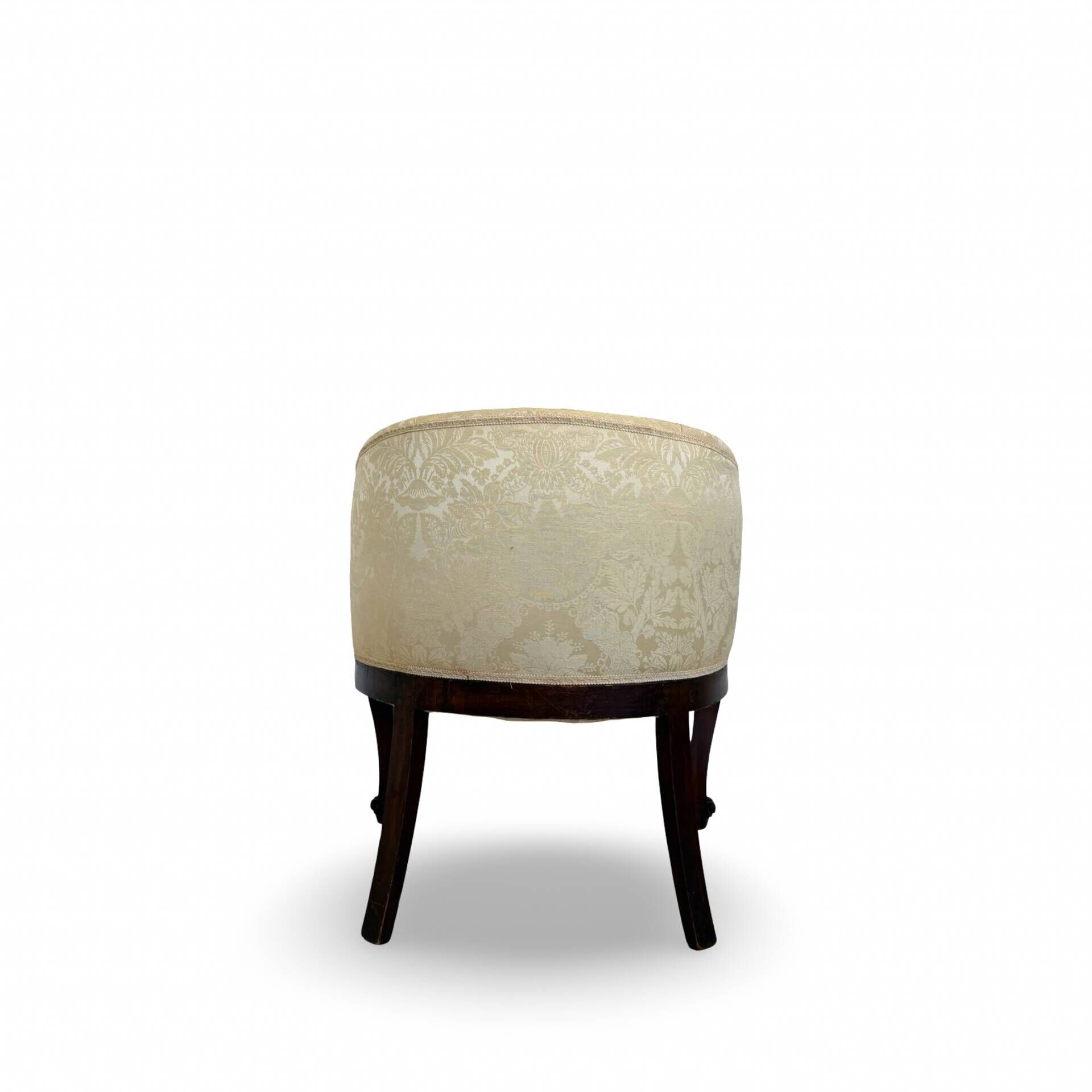 An antique Italian bar chair and a matching tufted vanity stool.