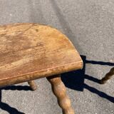 Pair of tripod farm stools in turned wood