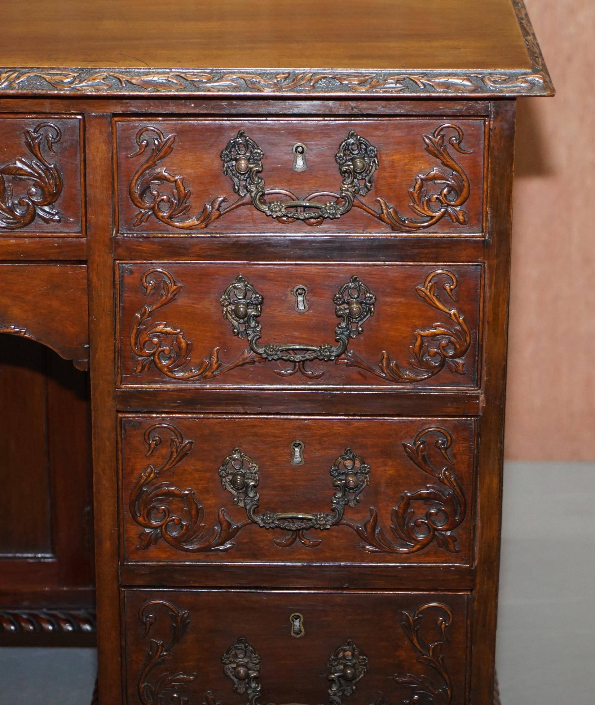 Victorian hand-carved kneehole desk 1850
