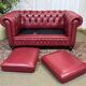 Chesterfield 2-seater leather sofa, modern production from the 2000s.