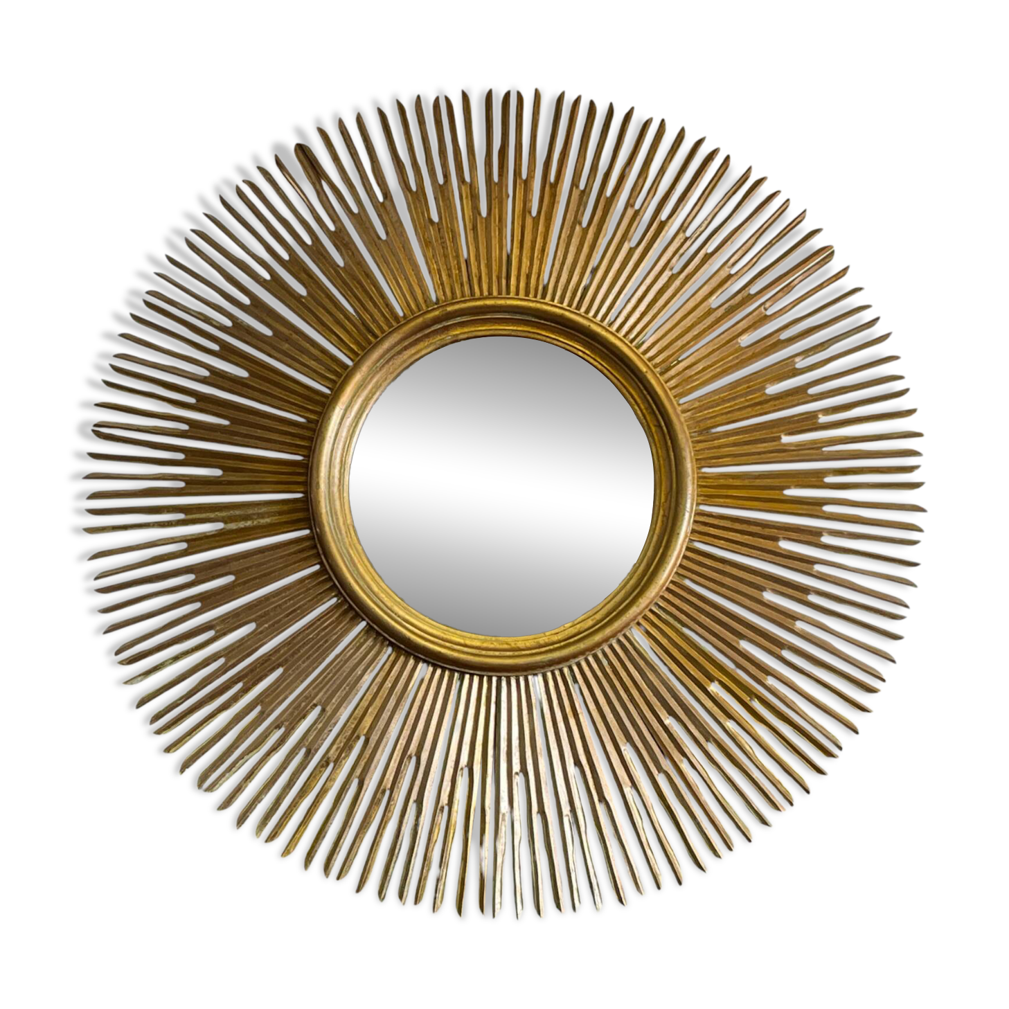 Large sunburst mirror with beveled glass and gilded wood from around 2010.
