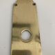 Brass door handle plate with lock entry.