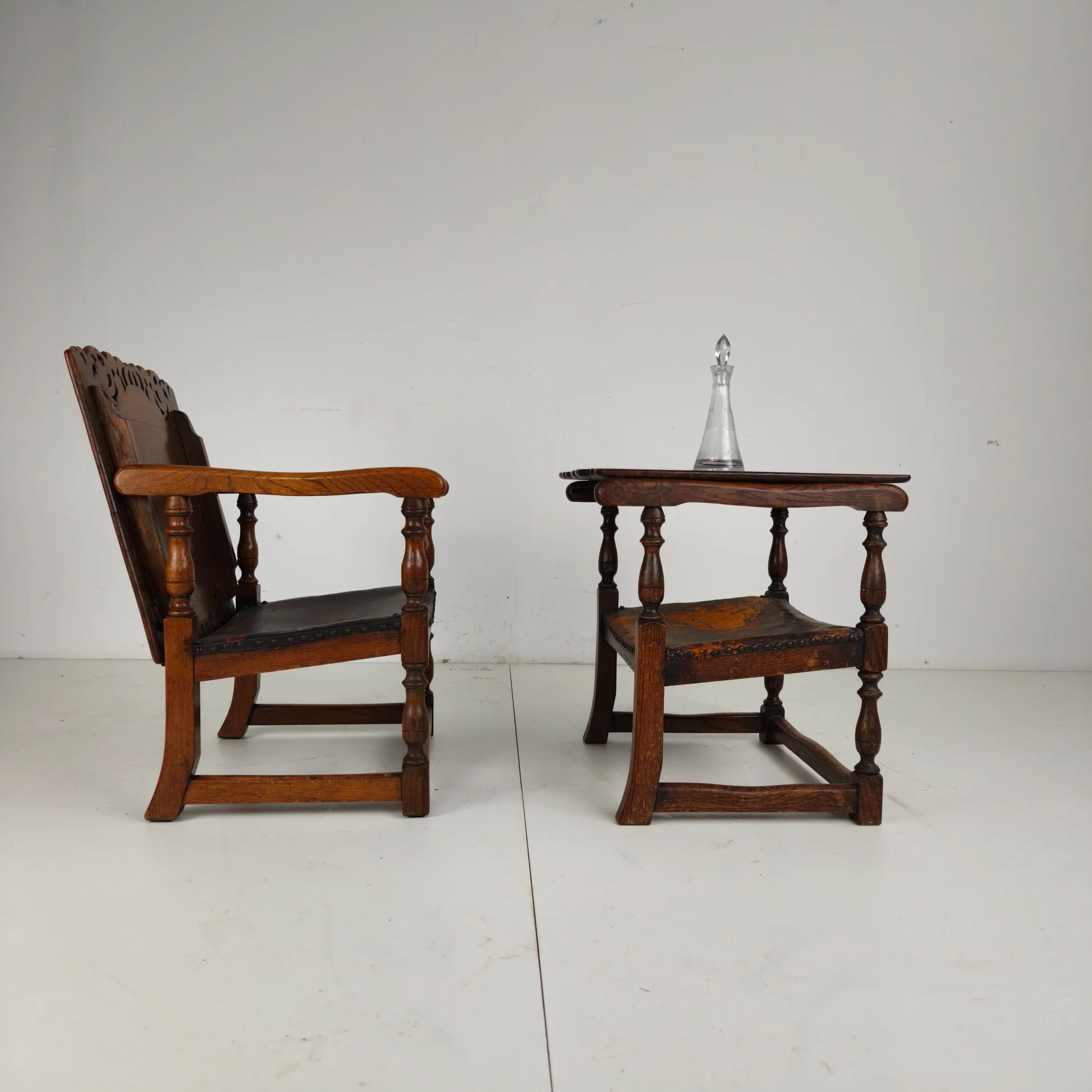 Pair of English antique Jacobean monk armchairs / tables by F. Parker & Sons Ltd