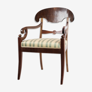 Late empire armchair in mahogany with light striped fabric from 1840s