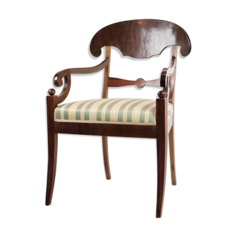 Late empire armchair in mahogany with light striped fabric from 1840s