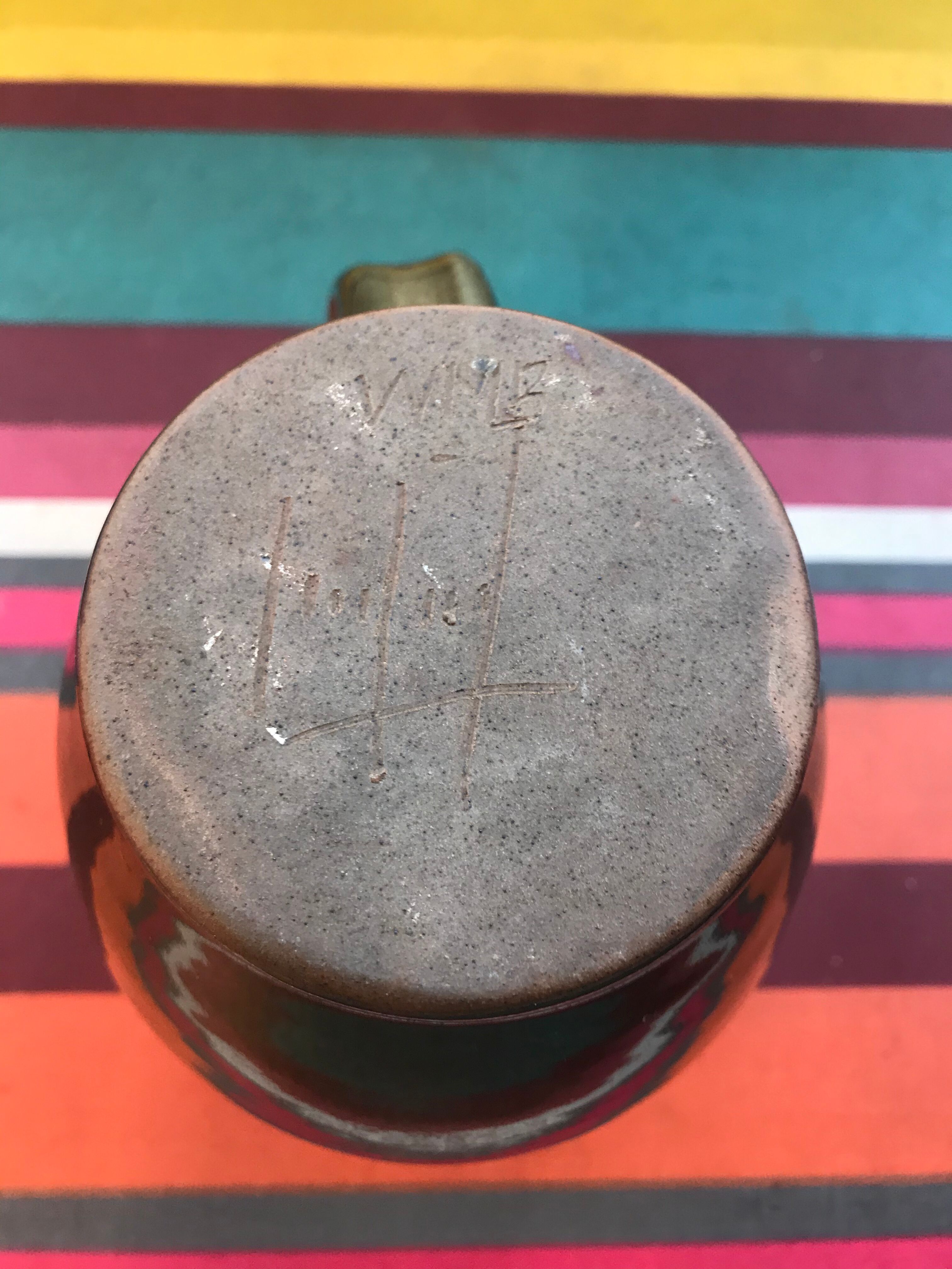 Former green enamelled sandstone pitcher