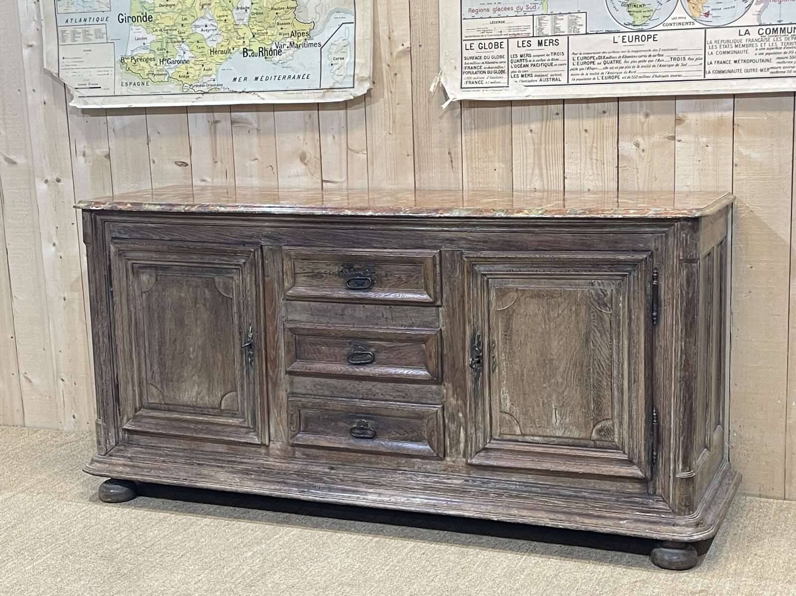 18th-century oak enfilade with a marble-effect painted top.