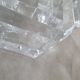 Candle holder or glass warmer with irregular ice effect.