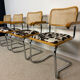4 fauteuils cannés chrome et bois années 70