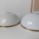 Set of 2 half-spherical opaline brass globes