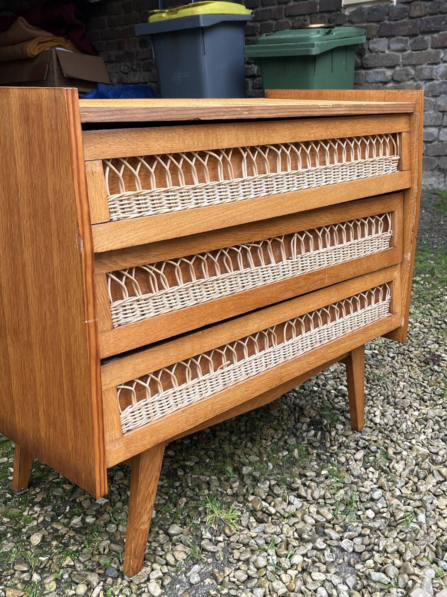 Rattan chest of drawers with tapered legs
