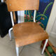 Old wooden and metal children's school chair