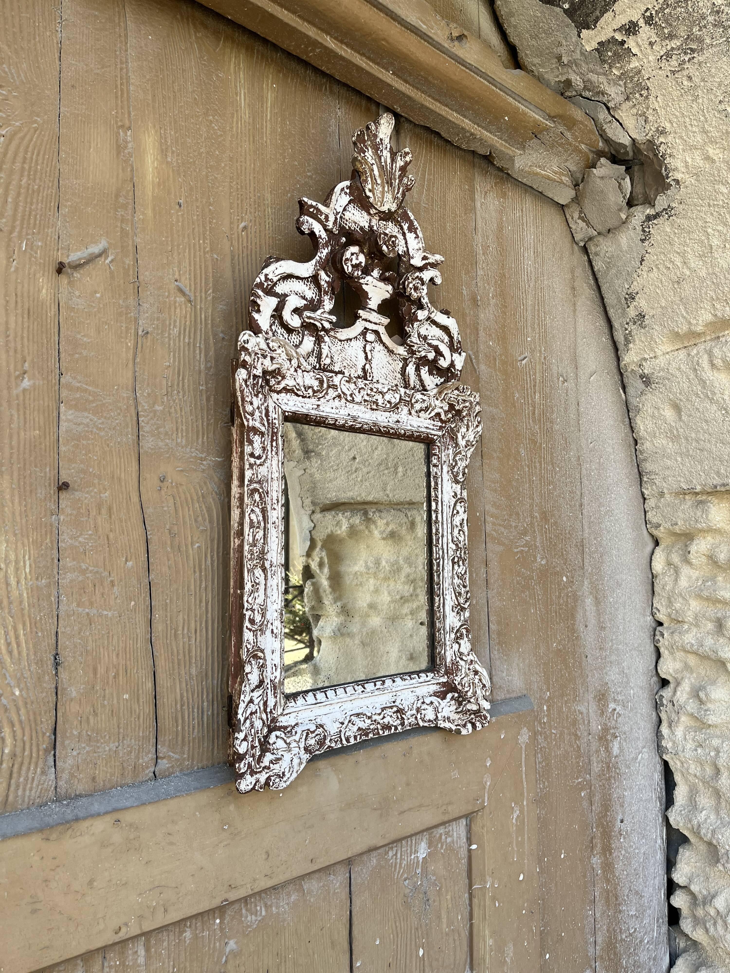 Carved wooden mirror