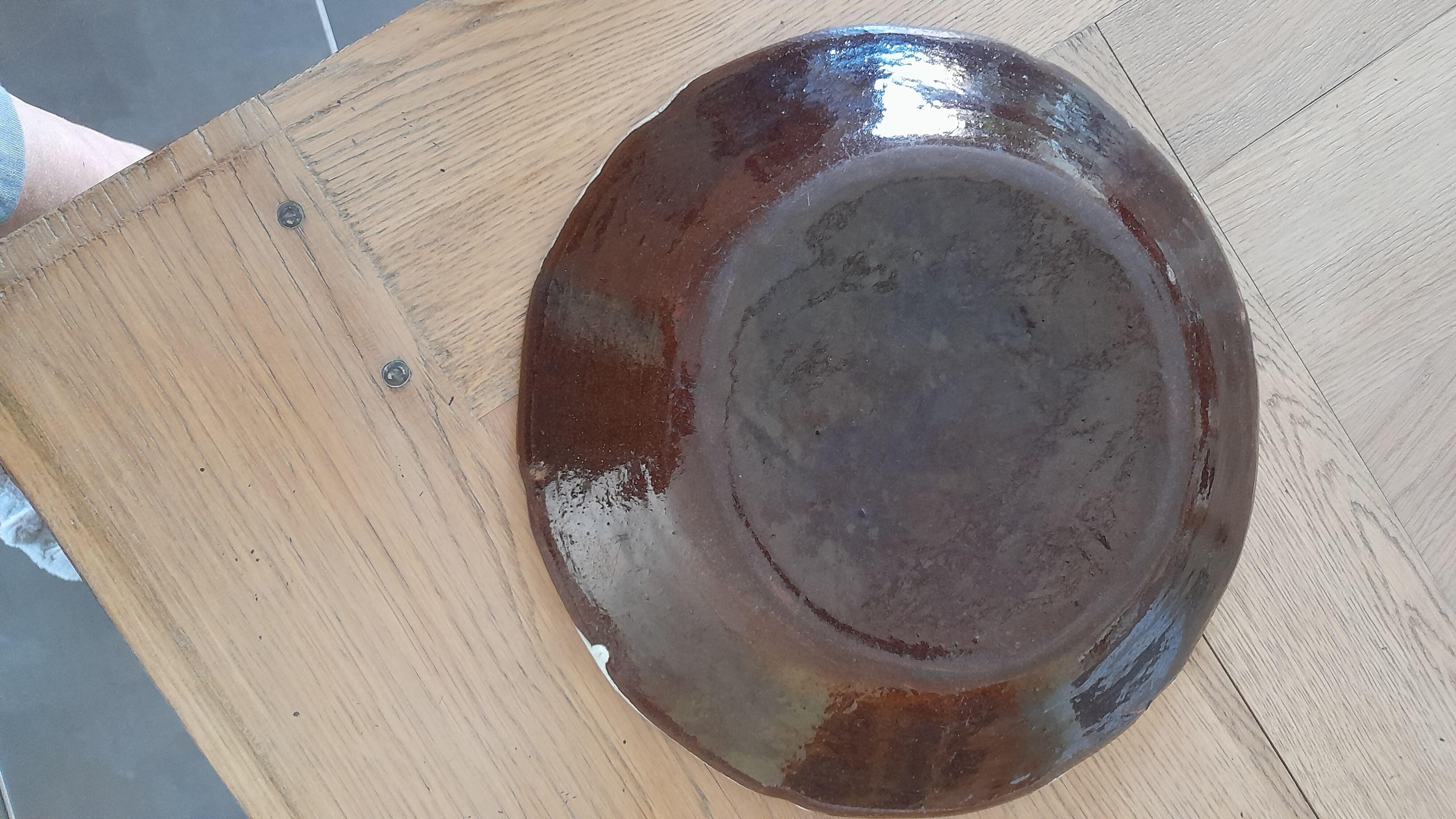 Old round dish in Rouen earthenware