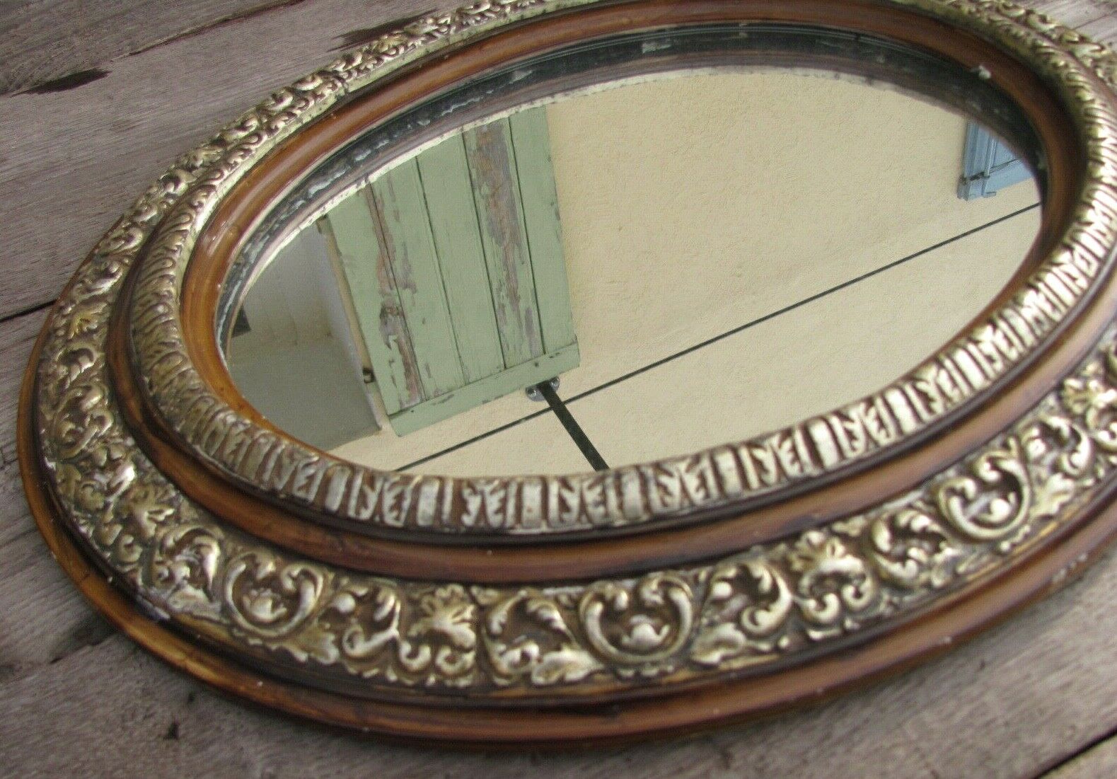 Oval mirror in gilded wood - 19th 46cm