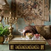 Antique wooden saddle-shaped plateau, gilded metal and onyx, circa 1900.