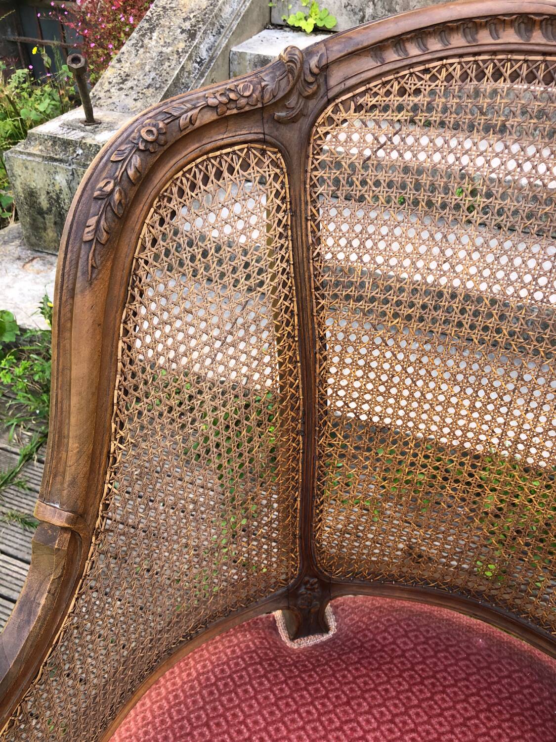 Louis XV style walnut and cane armchair