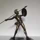 Large statue of Achilles, Greek warrior, marble base, ancient mythology.
