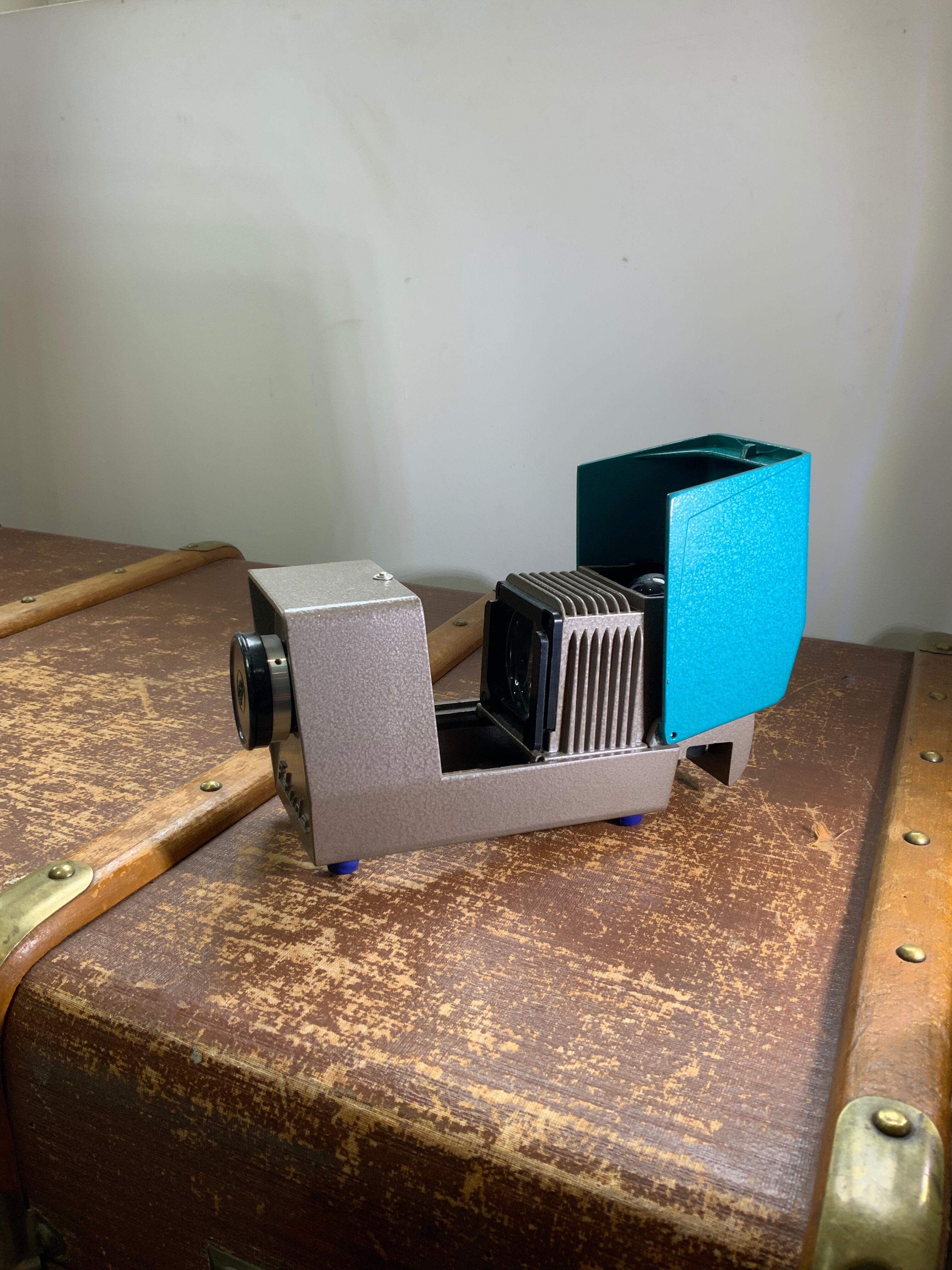 Vintage USSR slide projector in metal enamel blue and gray brand Optical study bulb