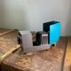 Vintage USSR slide projector in metal enamel blue and gray brand Optical study bulb