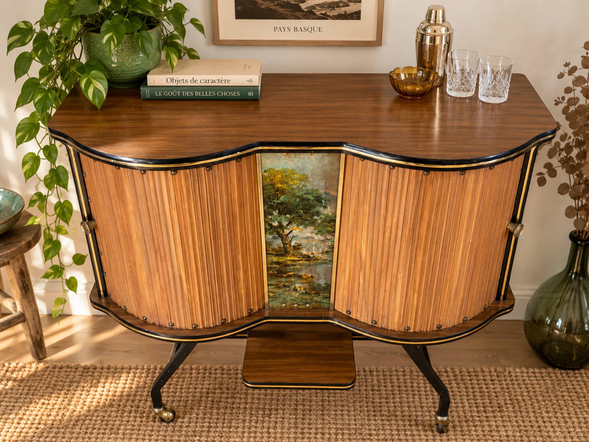 Vintage bar on wheels with tambour doors and painted decor – 1950s.